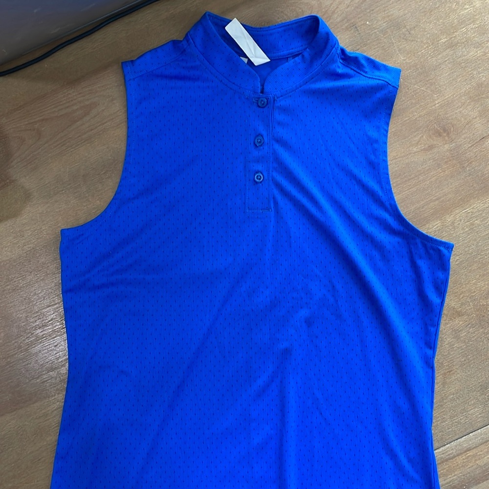 EUC kids Under Armour Sleeveless polo size Y LG.